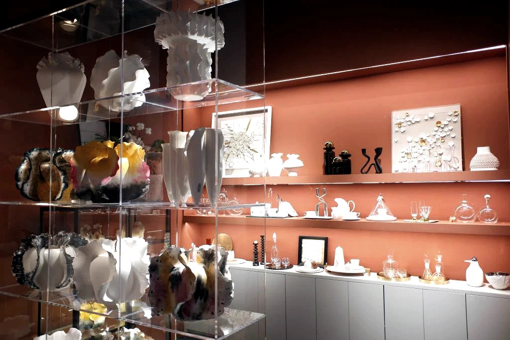 Cadrune objects displayed in a warm retail setting